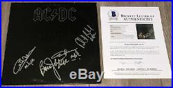 AC/DC SIGNED BACK IN BLACK VINYL RECORD ALBUM ANGUS YOUNG +3 with BECKETT BAS LOA