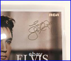 Collectible Elvis! Lithograph signed by Lisa Marie, RARE Pink Vinyl Album, more