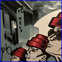 Devo Signed Vinyl Album 50 Years Of De-evolution Autographed LP Devo Signed Vinyl Album 50 Years Of De-evolution Autographed LP