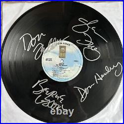 Eagles Signed Album. Autographed By Don Henley, Glen Frey, Don Felder, Etc