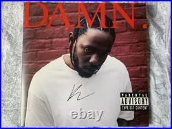 Kendrick Lamar Autographed Bundle Signed Vinyl, Shirt, And LP For DAMN Album