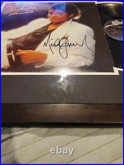 Micheal Jackson Autographed Professionally Framed Thriller Album And Vinyl. Coa