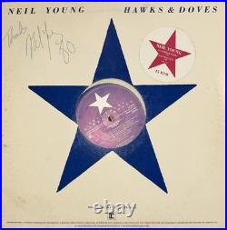 Neil Young Signed Autograph Album Vinyl Record LP Hawks & Doves with JSA COA Neil Young Signed Autograph Album Vinyl Record LP Hawks & Doves with JSA COA