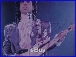 Prince's Purple Vinyl Album Single Purple Rain Autographed Coa