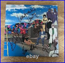 THE REVOLUTION signed vinyl album PRINCE AROUND THE WORLD IN A DAY