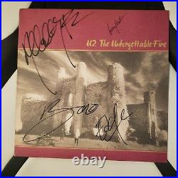 U2 signed vinyl album THE UNFORGETTABLE FIRE by 4 Artists
