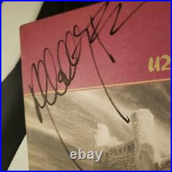 U2 signed vinyl album THE UNFORGETTABLE FIRE by 4 Artists