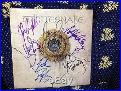 Whitesnake Vinyl Album Signed by all Members with certificate
